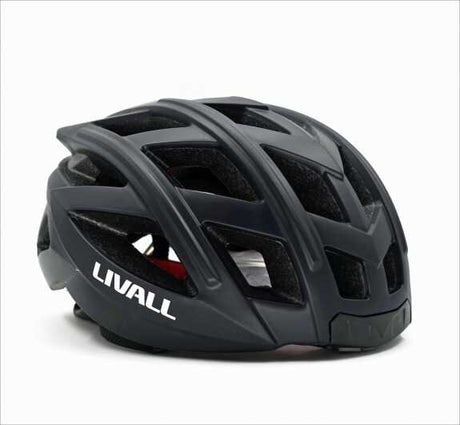 Schwarzer Fahrradhelm mit Belüftungsschlitzen und weißem "LIVALL"-Logo auf der Seite.